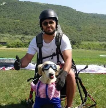 4 yıldır sahiplendiği 'Badem' adlı köpeğiyle uçuyor