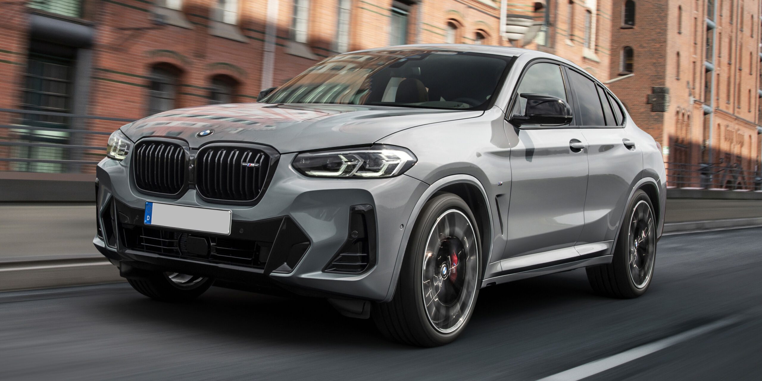42a69968-88f4-4898-8852-7341c749e57a_BMW_X4_Front_¾_moving-min